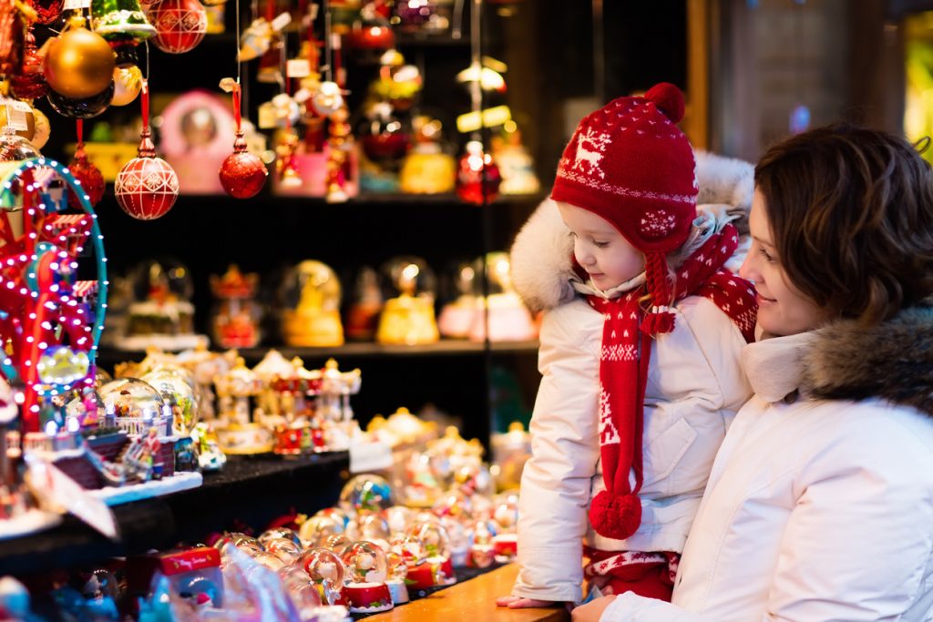 Mother and daughter Christmas shopping. Concept: How to hire employees for the holidays