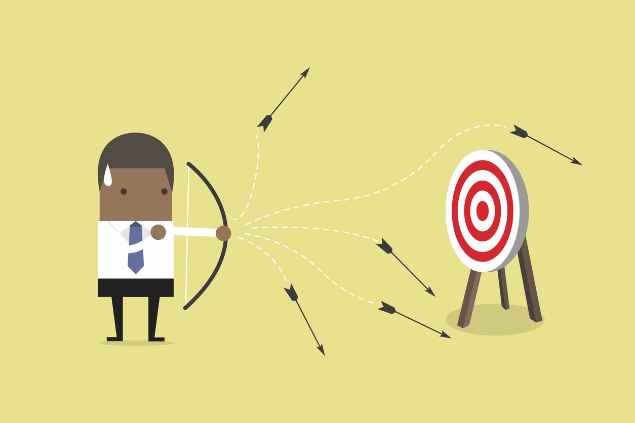 Businessman shooting arrows but missing. vector. concept: digital marketing