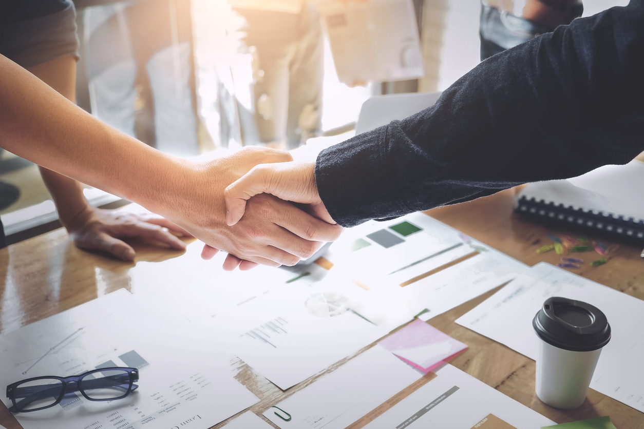 Business Partnership concept. business man shaking hands during a meeting in the office, success, dealing, greeting. Concept: