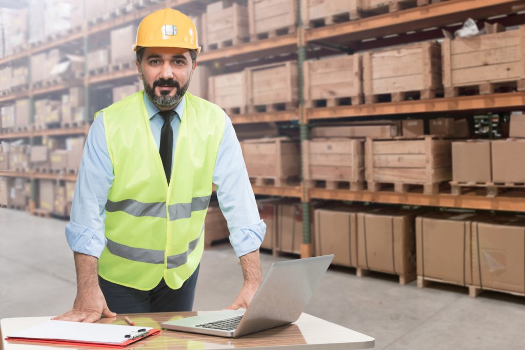 Business owner working warehouse.
