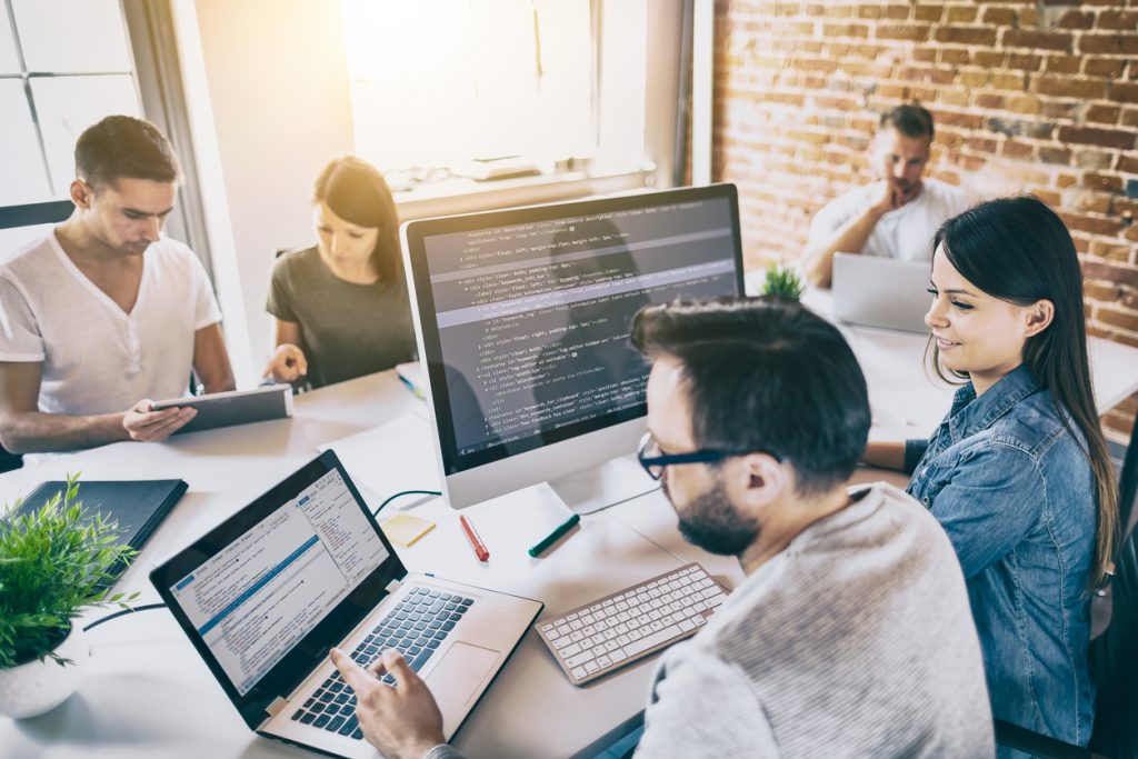 Developing programming and coding technologies. Security expert working in a a company's security. Protecting business information. Concept: How Can You Protect Your Business Information