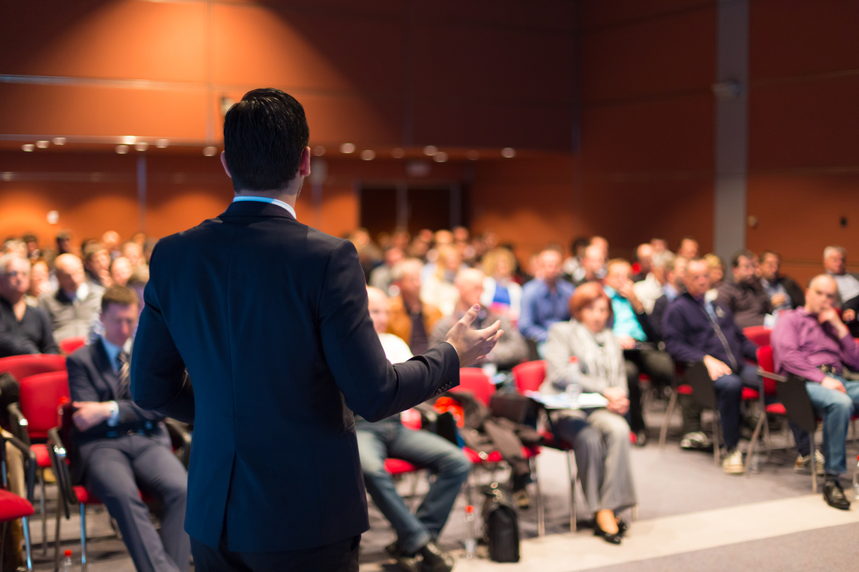 Speaker at Business Conference and Presentation. Audience at the conference hall. Concept: best business events and conferences