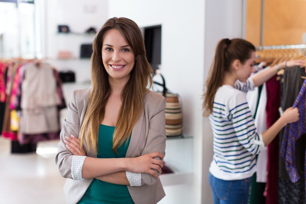 Sales assistant in clothing store. Concept: market share