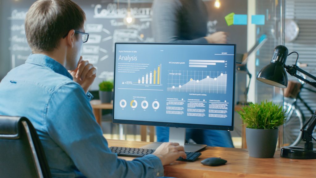Investor choosing types of investments on his computer.