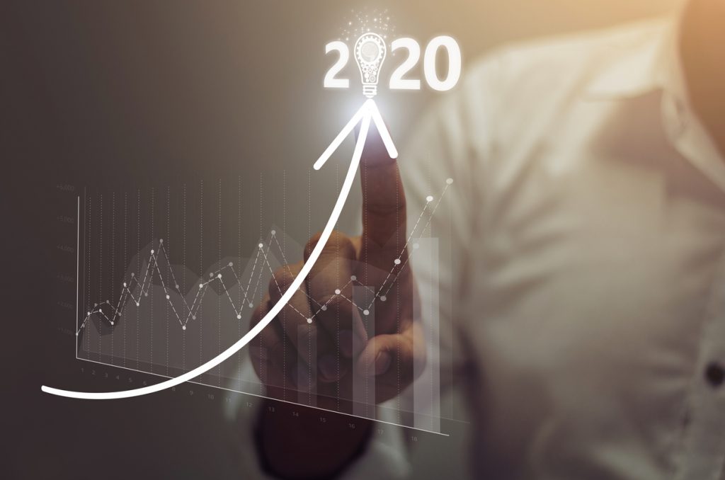 Businessman plan growth and increase of positive indicators in his business. Business growth concept year 2020. concept: expand business