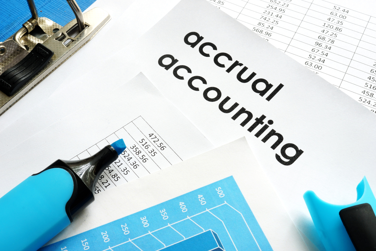 Accrual accounting document on a table. concept: Accrual Basis Accounting