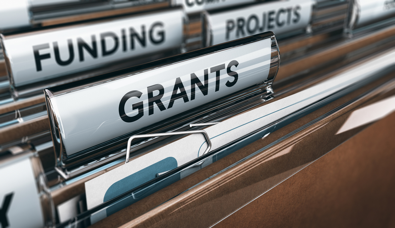 View of brown folders, with focus on grants label, Concept of funding, 3D illustration. concept: SBA grants