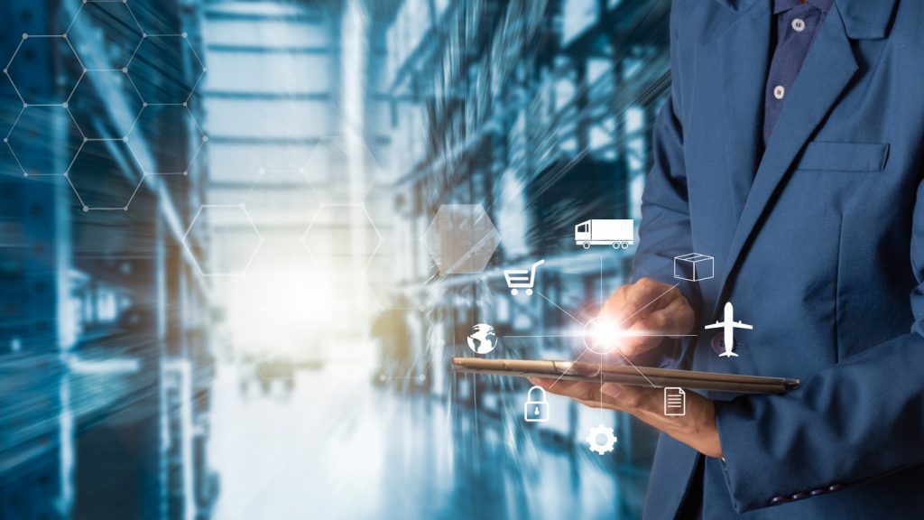 Business Logistics concept, Businessman manager using tablet check and control for workers with Modern Trade warehouse logistics. Industry 4.0. concept: inventory apps