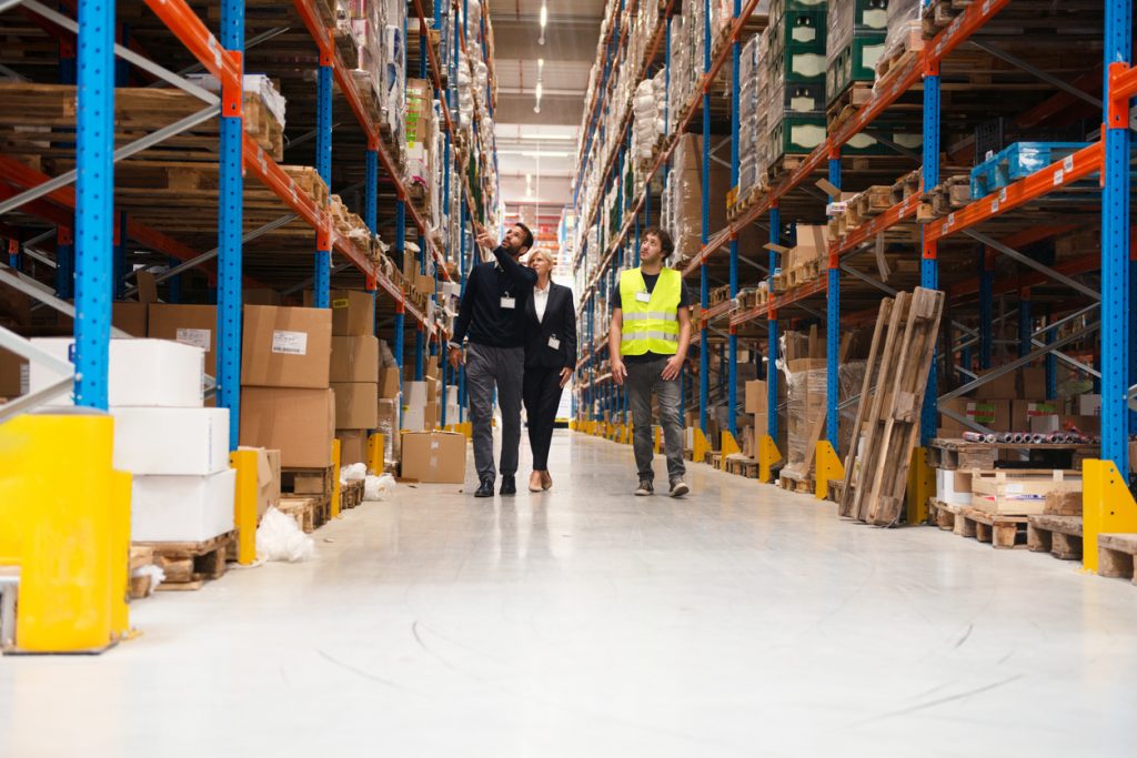 Supervisor taking inventory check. concept: inventory