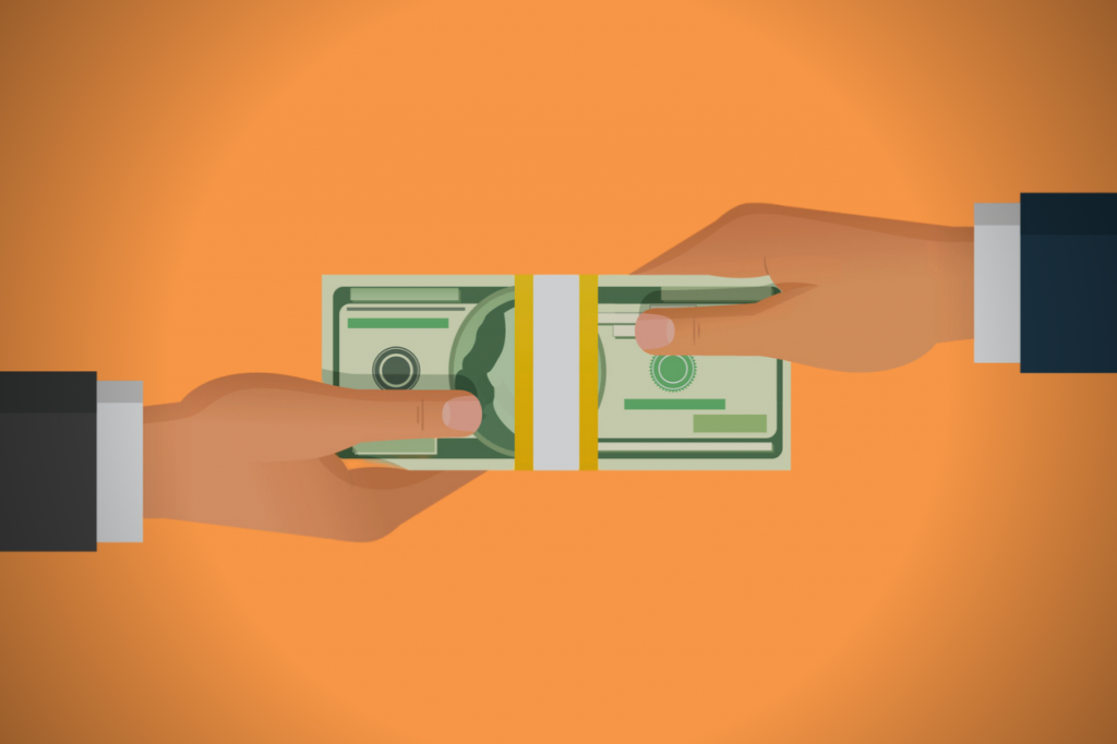 mano dando dinero a otra mano. concept: financiamiento para empresas